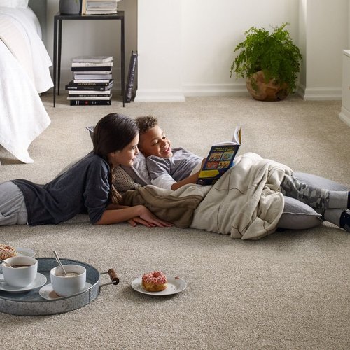 kids reading on bedroom floor from McMillen's Carpet Outlet in Clarion